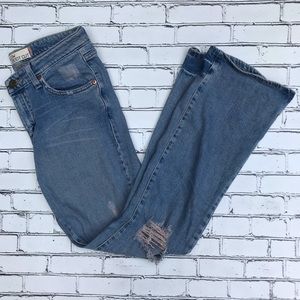 Levi’s 518 Superlow Bootcut Distressed Jeans